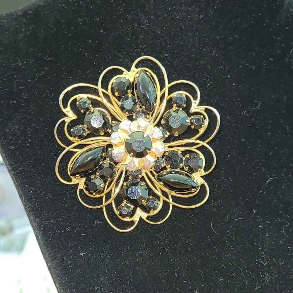 Vintage WEISS Black Rhinestone Flower Brooch Aurora Borealis Gold Tone Pin